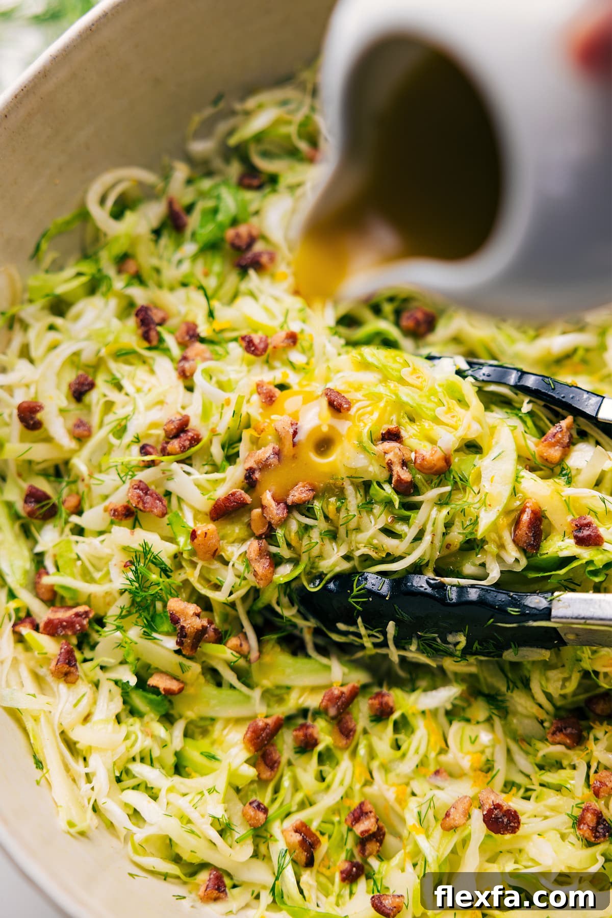 Apple Fennel Slaw with honey-Dijon dressing poured over the top.